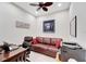 Home office with leather couch and work space at 718 Chipper Dr, Sun City Center, FL 33573