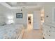 Spacious bedroom with walk-in closet and access to bathroom at 718 Chipper Dr, Sun City Center, FL 33573