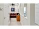 Home hallway with access to office and other rooms at 718 Chipper Dr, Sun City Center, FL 33573