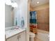 Small bathroom with shower/tub combo and granite vanity at 718 Chipper Dr, Sun City Center, FL 33573