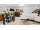 Comfortable bedroom with a double bed and adjacent dining area at 1215 S Keene Rd, Clearwater, FL 33756