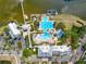 Aerial view of community pool and amenities with lake access at 406 Islebay Dr, Apollo Beach, FL 33572