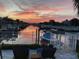 Serene canal views with private boat dock, lift, and paver patio at 406 Islebay Dr, Apollo Beach, FL 33572