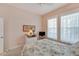 Bedroom with a view and plenty of natural light at 406 Islebay Dr, Apollo Beach, FL 33572