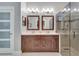 Elegant bathroom with double vanity, large shower, and modern fixtures at 406 Islebay Dr, Apollo Beach, FL 33572