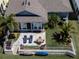 Backyard oasis with patio furniture and kayaks, perfect for relaxing at 406 Islebay Dr, Apollo Beach, FL 33572