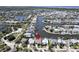 Aerial view showing home location on waterfront canal at 406 Islebay Dr, Apollo Beach, FL 33572