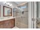 Bathroom with walk-in shower, modern fixtures and a single vanity at 406 Islebay Dr, Apollo Beach, FL 33572