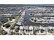 Aerial view of a canal-front community with many houses at 406 Islebay Dr, Apollo Beach, FL 33572