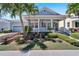 Charming house exterior with a front porch and landscaping at 406 Islebay Dr, Apollo Beach, FL 33572