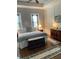 Main bedroom with hardwood floors, king-size bed, and ceiling fan at 406 Islebay Dr, Apollo Beach, FL 33572