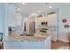 Modern kitchen with granite countertops and stainless steel appliances at 406 Islebay Dr, Apollo Beach, FL 33572