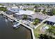Aerial view of home, backyard, boat lift and canal at 406 Islebay Dr, Apollo Beach, FL 33572
