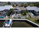 Aerial view of home, backyard, boat lift and canal at 406 Islebay Dr, Apollo Beach, FL 33572