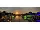 Scenic waterfront view at sunset with boats and houses at 406 Islebay Dr, Apollo Beach, FL 33572