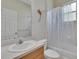 Simple bathroom with a tub shower combo and vanity at 3526 Wiggins Meadows Ct, Plant City, FL 33566