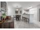 Dining area with kitchen view, featuring a modern style at 4306 Bayside Village Dr # 204, Tampa, FL 33615