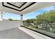 This is a beautiful balcony with glass railings and a view of the water at 534 Estuary Shore Ln, Apollo Beach, FL 33572
