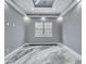 This bedroom features neutral walls, stylish flooring, recessed lighting, and a ceiling fan at 534 Estuary Shore Ln, Apollo Beach, FL 33572