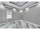 This bedroom features neutral walls, stylish flooring, recessed lighting, and a ceiling fan at 534 Estuary Shore Ln, Apollo Beach, FL 33572