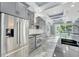 Modern kitchen with stainless steel appliances and plenty of counterspace for food prep at 534 Estuary Shore Ln, Apollo Beach, FL 33572