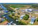 Waterfront home with pool and private dock, shown in the context of the surrounding area at 548 Estuary Shore Ln, Apollo Beach, FL 33572