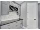 Gray kitchen cabinets and wine rack at 534 Estuary Shore Ln, Apollo Beach, FL 33572