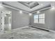 Bright bedroom with large window and unique flooring at 534 Estuary Shore Ln, Apollo Beach, FL 33572