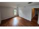 Spacious bedroom with hardwood floors and ceiling fan at 2275 Willowbrook Dr, Clearwater, FL 33764