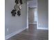 Bedroom with hardwood floors and decorative wall art at 213 W Giddens Ave, Tampa, FL 33603