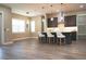Open concept kitchen with island and hardwood floors at 213 W Giddens Ave, Tampa, FL 33603