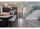 Modern kitchen with island and stainless steel appliances at 213 W Giddens Ave, Tampa, FL 33603