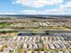 Aerial view of neighborhood near canal and highway at 1830 E Del Webb Blvd, Sun City Center, FL 33573