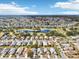 Aerial view of community with golf course and lake at 1830 E Del Webb Blvd, Sun City Center, FL 33573
