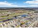 Aerial view of neighborhood near canal and highway at 1830 E Del Webb Blvd, Sun City Center, FL 33573