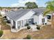Aerial showcasing home's backyard and landscaping at 1830 E Del Webb Blvd, Sun City Center, FL 33573