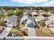 Aerial view of single Gathering home in a neighborhood at 1830 E Del Webb Blvd, Sun City Center, FL 33573