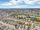 Aerial showing neighborhood near golf course and lake at 1830 E Del Webb Blvd, Sun City Center, FL 33573