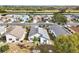 Aerial view of home showcasing backyard and landscaping at 1830 E Del Webb Blvd, Sun City Center, FL 33573