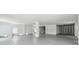 Spacious unfinished basement featuring a garage entrance for storage and flex space at 3380 Holly Springs Dr, Hernando Beach, FL 34607