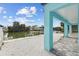 Rear of the house with views of the water, white gravel, and a serene waterfront location at 3380 Holly Springs Dr, Hernando Beach, FL 34607