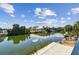 Picturesque waterfront home showcasing the community's peaceful and scenic water views at 3380 Holly Springs Dr, Hernando Beach, FL 34607