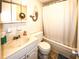 Clean bathroom with a tub shower combination and updated vanity at 4746 Azalea Dr # 109, New Port Richey, FL 34652