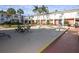 Community courtyard with patio furniture and lush landscaping at 4746 Azalea Dr # 109, New Port Richey, FL 34652