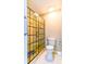 Clean bathroom with a toilet and a shower stall at 2410 Lancaster Dr, Sun City Center, FL 33573