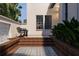 Charming courtyard with brick steps, decorative tiling, and comfortable seating at 5009 W Spring Lake Dr, Tampa, FL 33629
