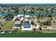 Aerial shot of the beautiful home and the surrounding neighborhood, featuring waterfront views at 3230 Azalea Drive # Lot 13, Hernando Beach, FL 34607