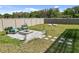 Relaxing fire pit area with seating, perfect for outdoor gatherings at 9358 Rally Spring Loop, Wesley Chapel, FL 33545