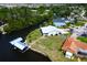 Aerial view showcasing waterfront home and canal at 821 White Heron Blvd, Ruskin, FL 33570