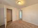 Bedroom with access to a hallway and additional bedroom at 6949 Crested Orchid Dr, Brooksville, FL 34602